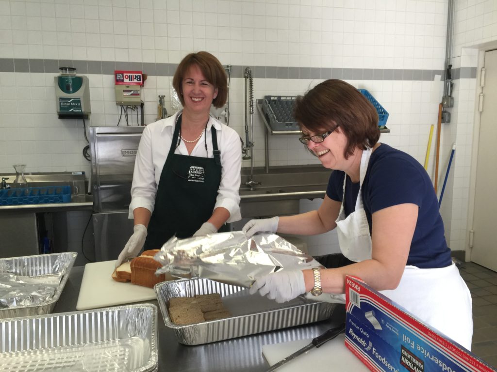 Caroline and Sue Making afternoon tea sandwiches at the DCA