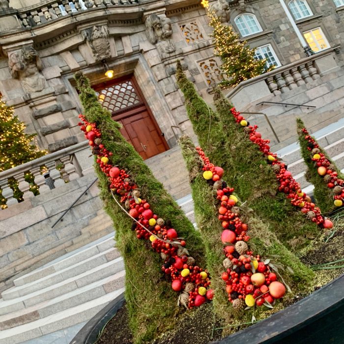 changing floral displays outside parliament in Copenhagen 